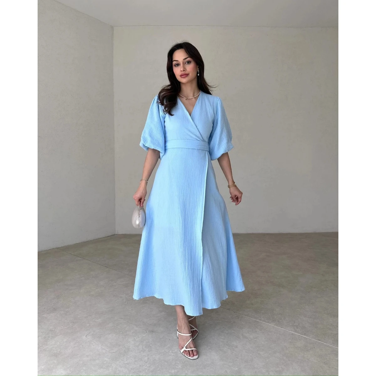 Elegant sky-blue wrap dress