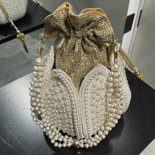 Pearl design hand bag